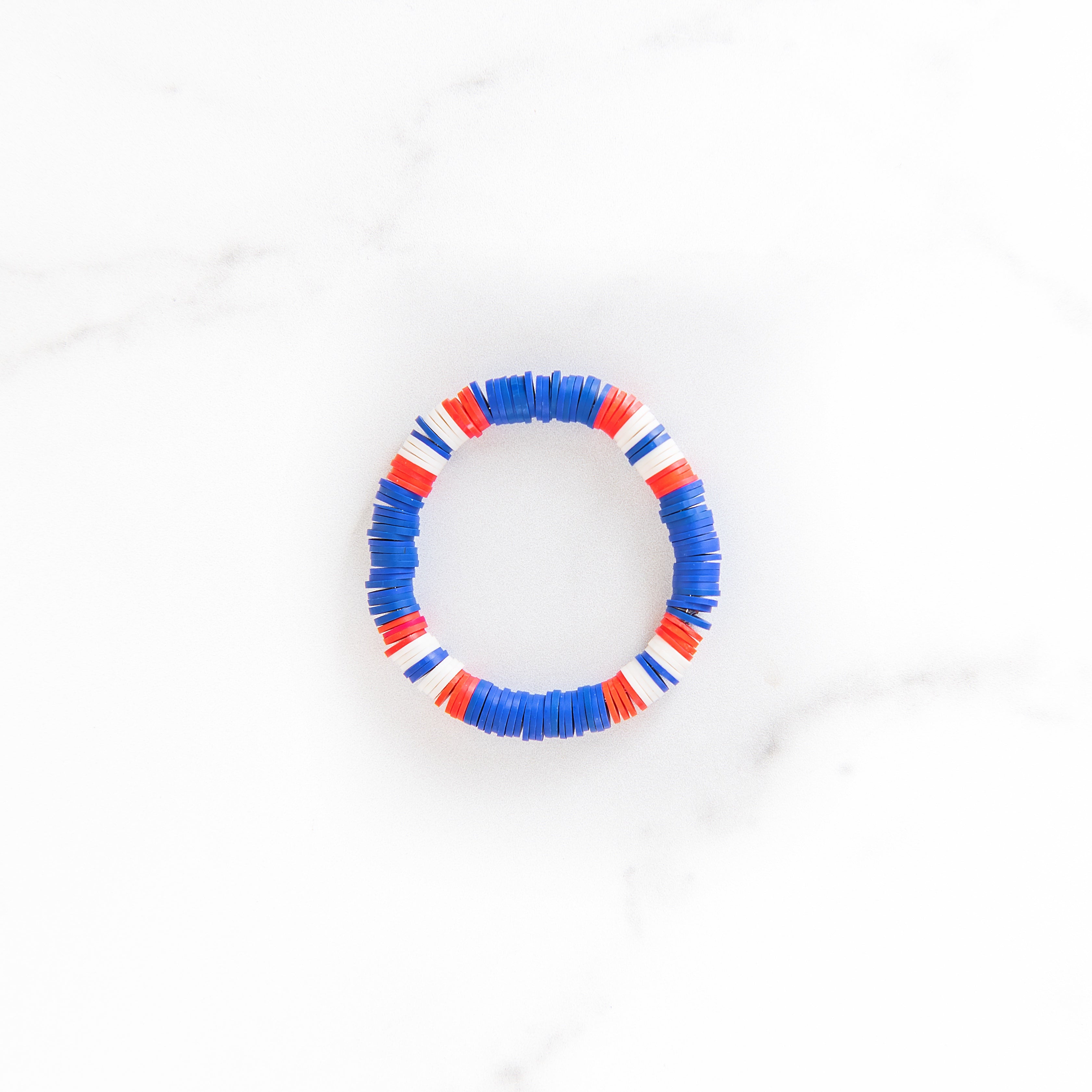 Blue and White Clay Bead Bracelet  Bracelets handmade beaded, Beaded  bracelets, Clay bead necklace