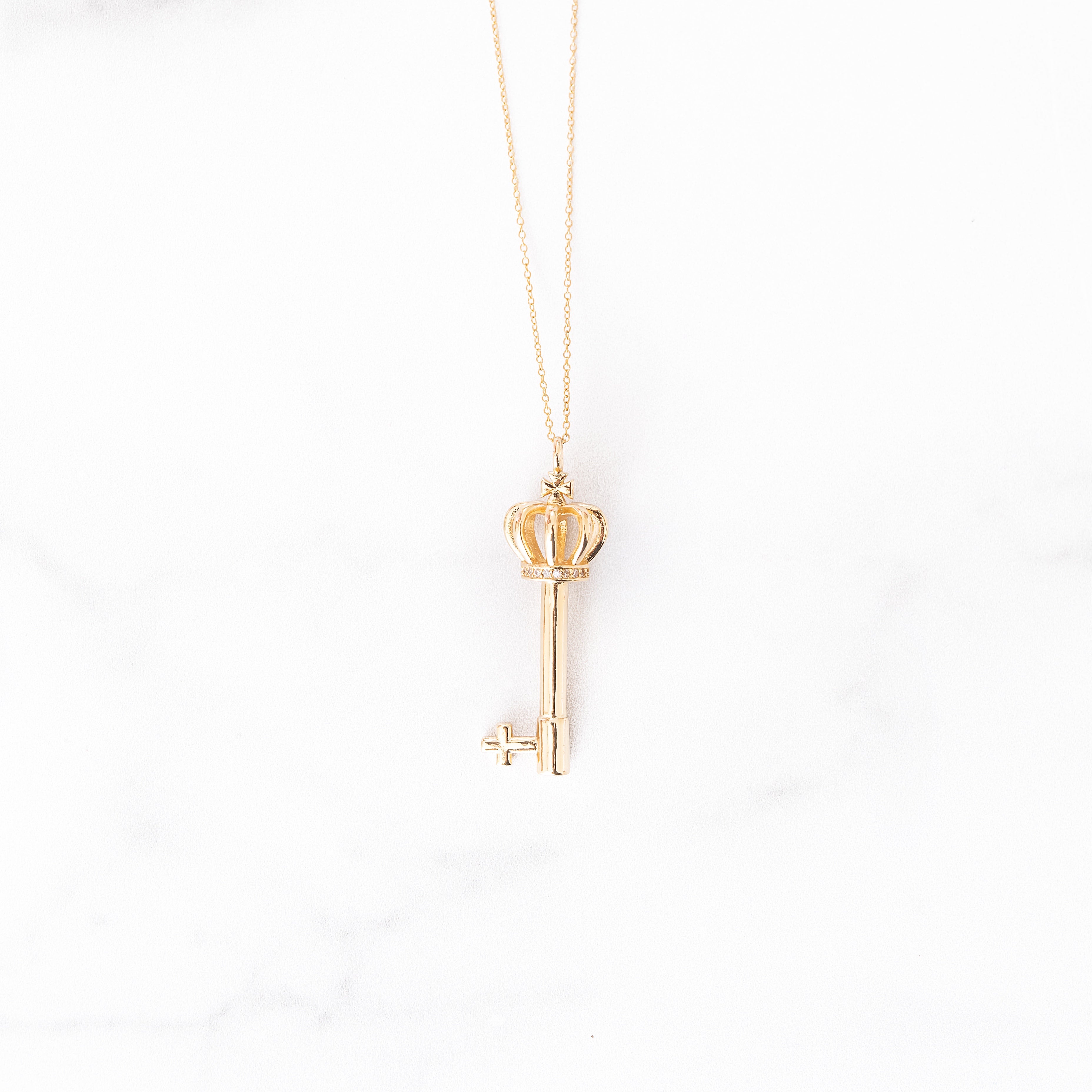 Unlocking the Meaning Behind Tiffany Key Pendants - Academy by