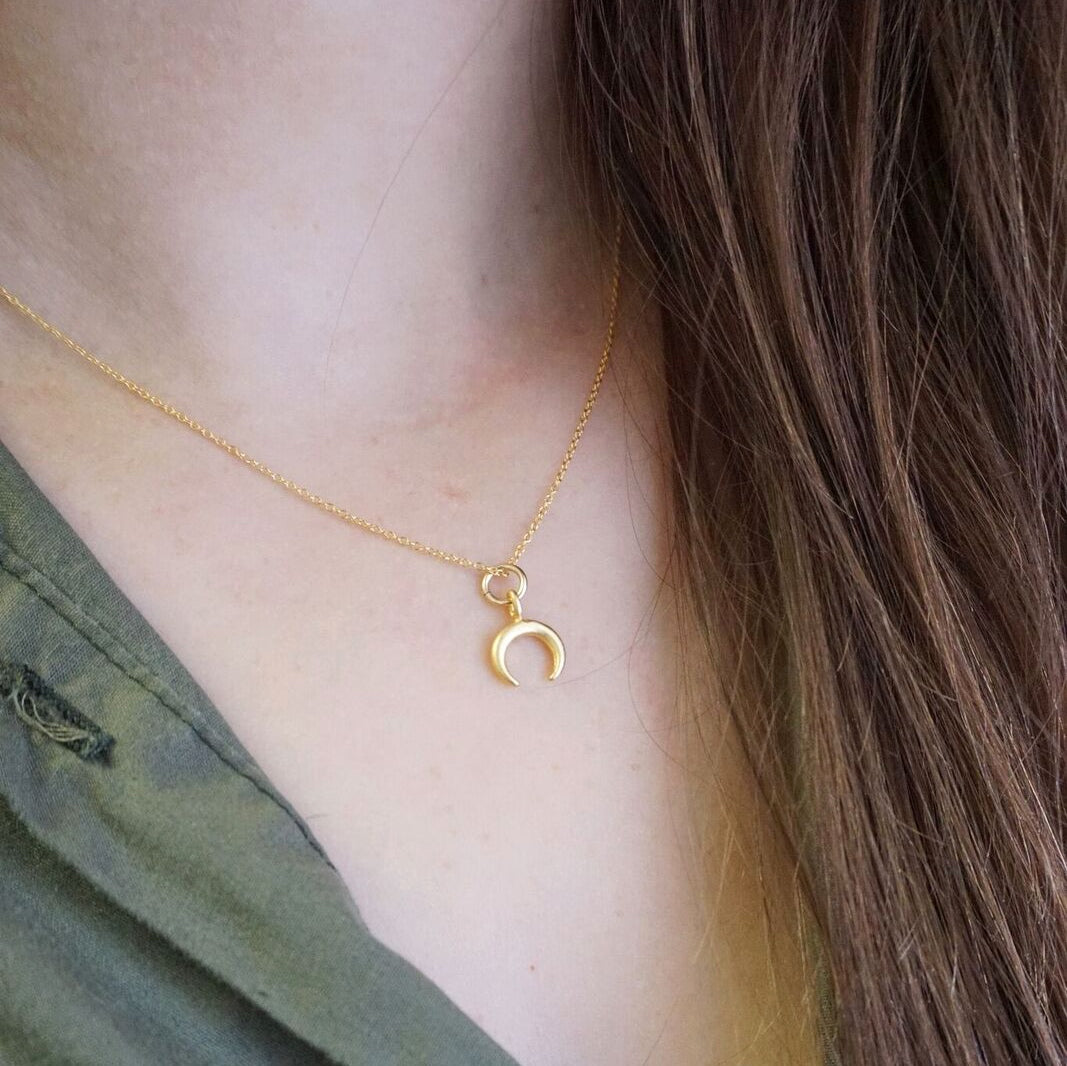 Gold double sales horn necklace