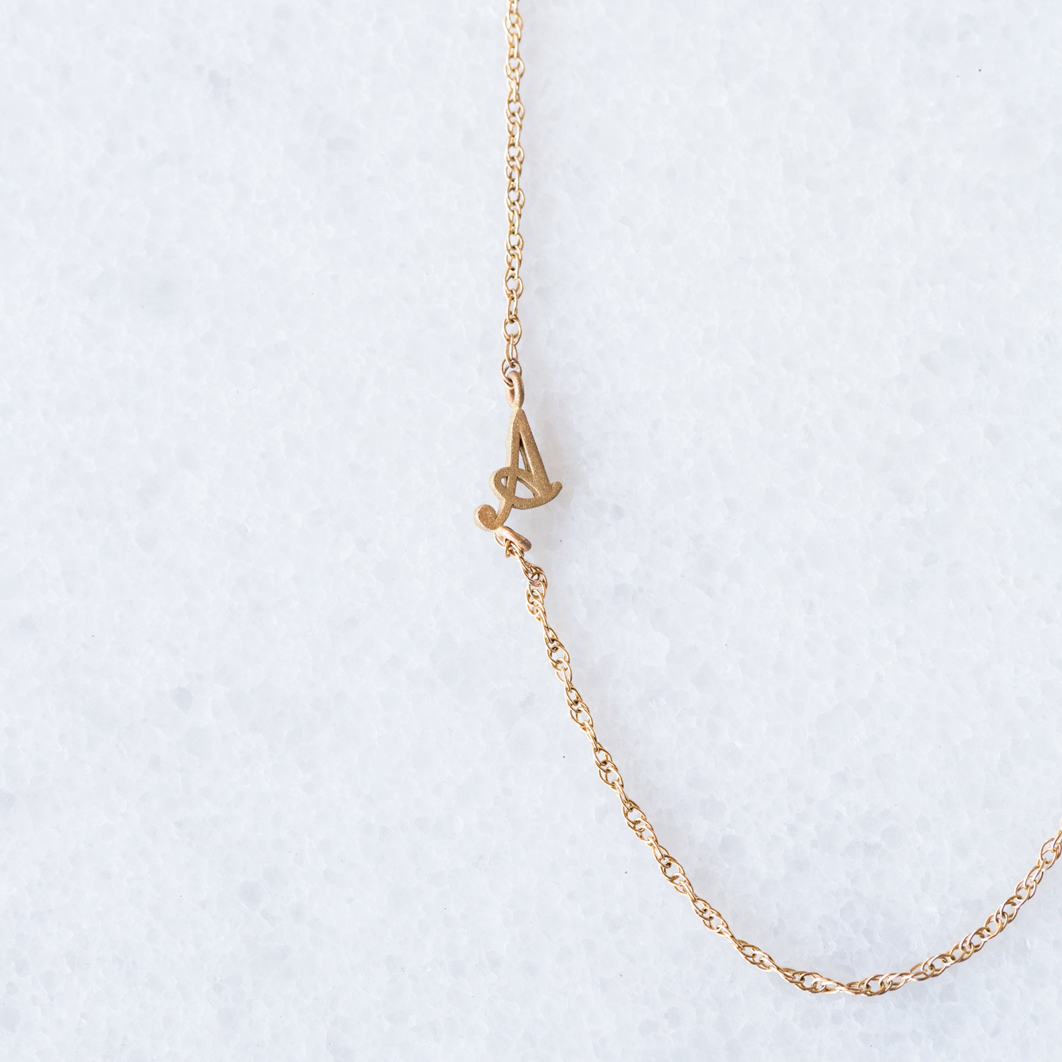 The Tiny Sideways Initial Necklace– grace + hudson